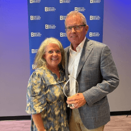 Jim and Laura Woods receiving the BBB Torch Award for Ethics